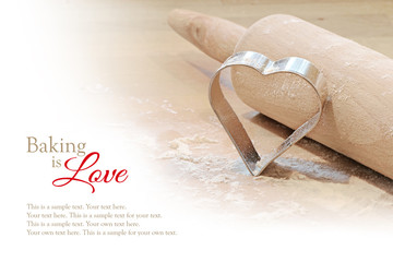 baking background, heart cookie cutter and rolling pin