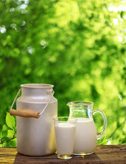 Fresh organic milk. Nature background.