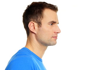 Profile of young man in blue shirt