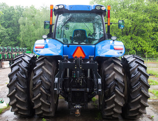 Rear view of the new blue tractor