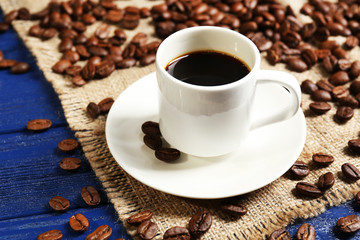 Cup of coffee on wooden table