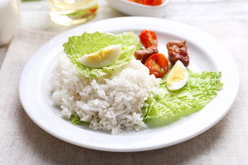 Boiled rice served on table, close-up