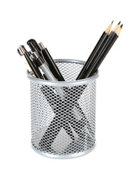 Black pens and pencils in metal vase isolated