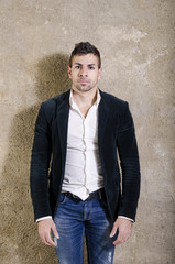 Obraz premium Young sexy man in studio shot
