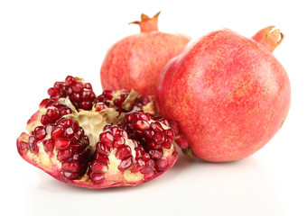 Juicy ripe pomegranates, isolated on white