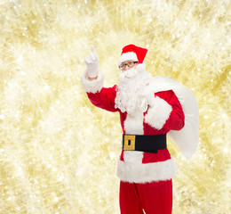 man in costume of santa claus with bag