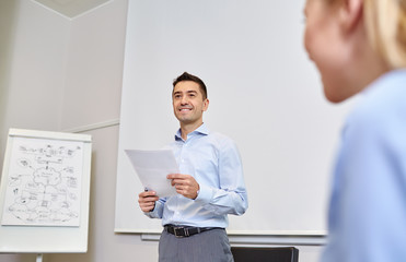 smiling business people meeting in office