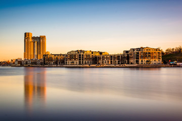 Long exposure of waterfront condominiums at the Inner Harbor in