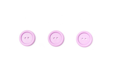 Purple plastic button with two pins on White Isolate Background
