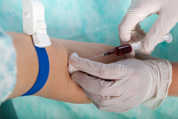 Close-up of taking blood sample