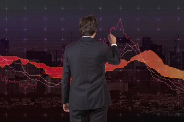 businessman drawing graphic