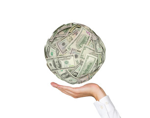 hand holding money ball