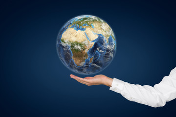 Hand holding Planet.