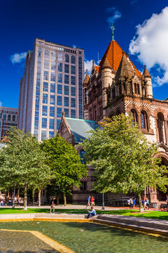 Pool of water and Trinity Church, at Copley Square in Boston, Ma