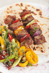 Grilled meat and vegetable skewer