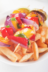 Grilled vegetable skewer with french fries