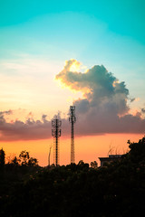 sunset sky with silhouette antenna
