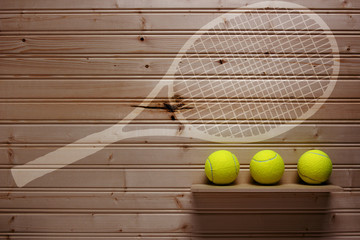 Three tennis balls and imprint racket