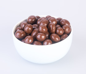 chocolate balls. chocolate balls in bowl on a background