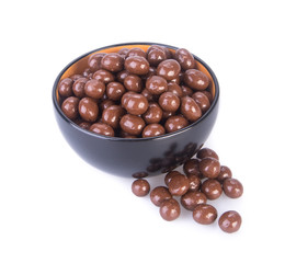 chocolate balls. chocolate balls in bowl on a background
