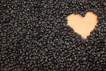 Black beans with heart shape space