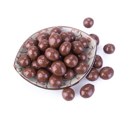 chocolate balls. chocolate balls in bowl on a background