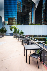 Dining area and modern buildings in downtown Charlotte, North Ca