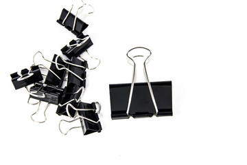 Black Paper clips on white background.