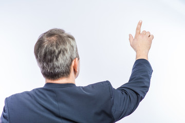 businessman pushing forefinger screen