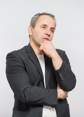 Businessman showing the big blank card in hand