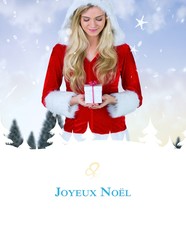 Composite image of pretty girl in santa outfit holding gift