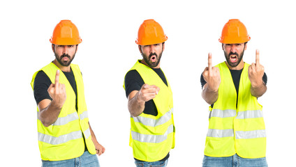Workman making horn gesture over white background