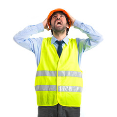 frustrated workman over white background