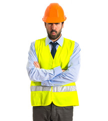 Sad worker over white background