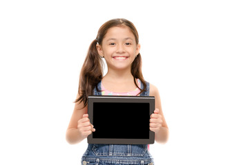 Little girl holding tablet on white background