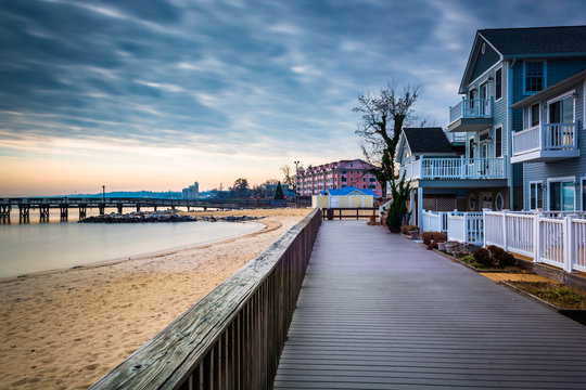 House on the boardwalk and the shore of the Chesapeake Bay, in N