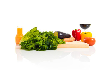 Fruits and vegetables over white background