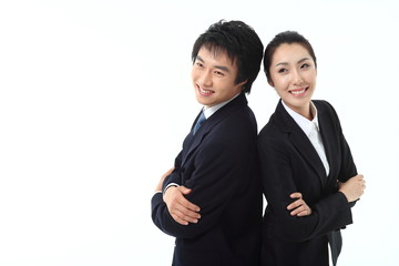 등으로 서로 맞대고 선 비즈니스맨과 비즈니스 우먼