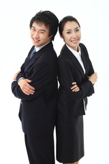 등으로 서로 맞대고 선 비즈니스맨과 비즈니스 우먼