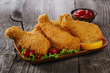 fried chicken leg breaded