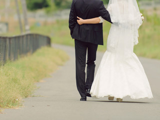 Fototapeta na wymiar Walking Embracing Couple