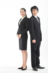 등을 맞대고 서있는 비즈니스 여성과 남성