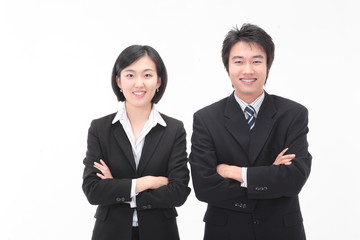 똑바로 서서 카메라를 응시하는 비즈니스 남성과 여성