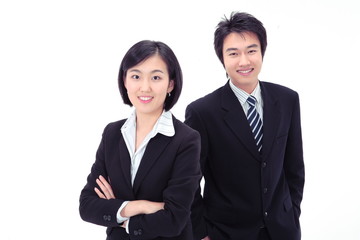 똑바로 서서 카메라를 응시하는 비즈니스 남성과 여성