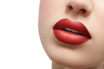Obraz premium red lips close up on a white background