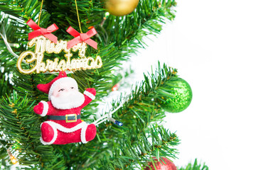 Santa hang at the Christmas tree