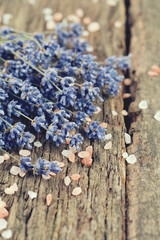 lavender and himalayan salt on wooden surface