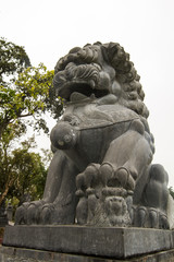Close up view of a beautiful lion statue on a park.