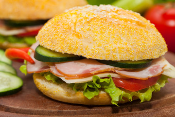 Sandwich with ham, cheese and salad