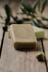 Olive handmade soap on the wooden table